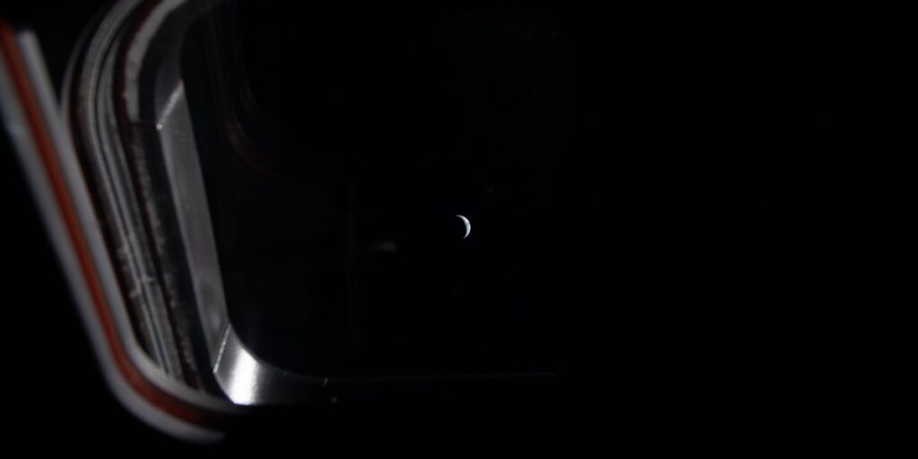 Nasa crew shares chilling photo of Earth as Orion capsule prepares to shoot around dark side of the Moon Nasa crew shares chilling photo of Earth as Orion capsule prepares to shoot around dark side of the Moon