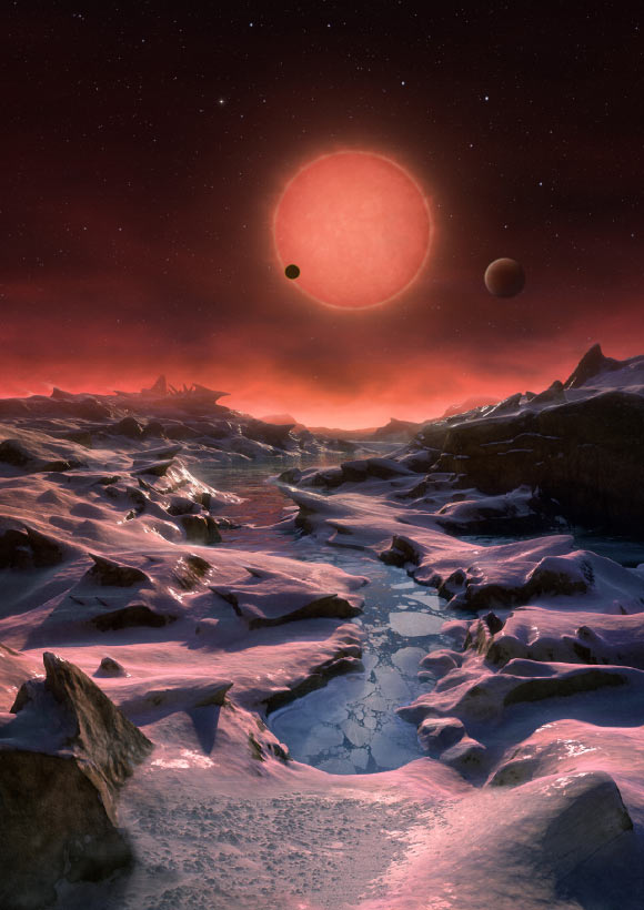 Two Earth-Size Worlds in TRAPPIST-1 System Reveal Stark Divide Between Day and Night This artist’s impression shows an imagined view from the surface one of the three exoplanets orbiting the ultracool dwarf star TRAPPIST-1 38.8 light-years from Earth. These alien worlds have sizes and temperatures similar to those of Venus and Earth. In this view one of the inner planets is seen in transit across the disc of TRAPPIST-1. Image credit: M. Kornmesser / ESO.