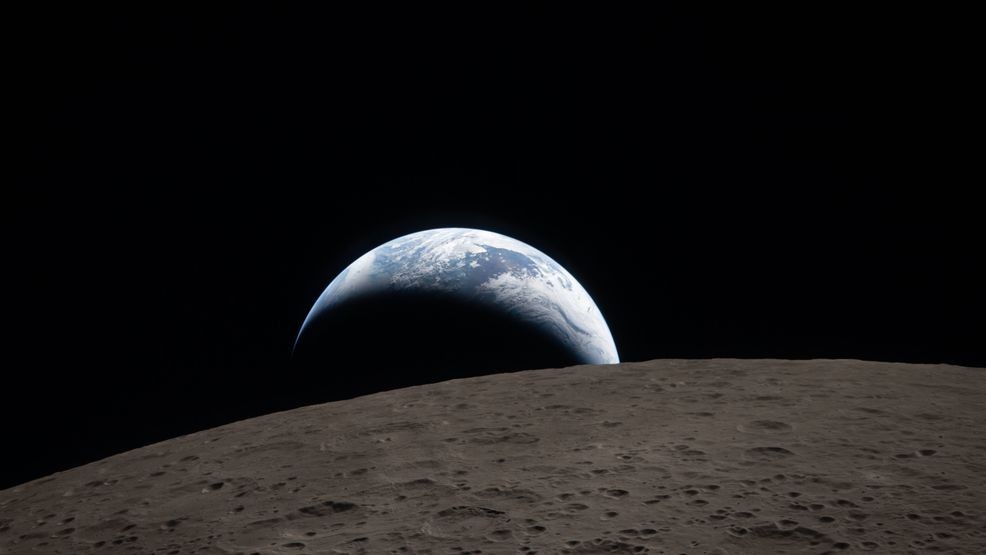 In this image provided by NASA, The Artemis II crew captured this view of an Earthset on Monday, April 6, 2026, as they flew around the Moon. (NASA via AP)