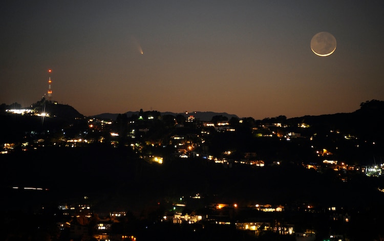 The comet PANSTARRS is seen next to the waxing crescent moon. (Photo: Reuters)
