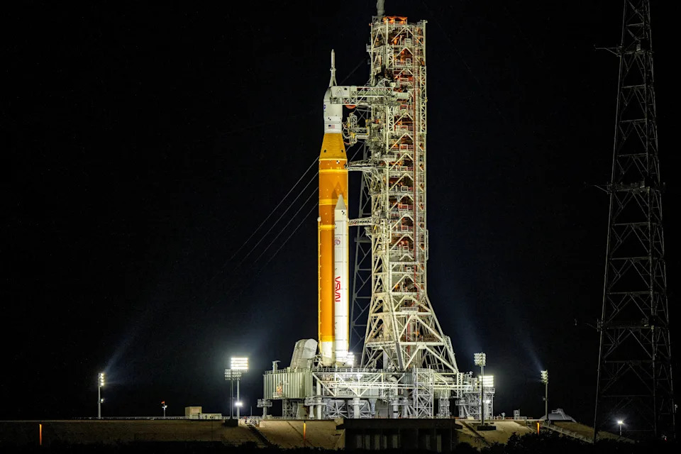 A rocket on a launchpad.