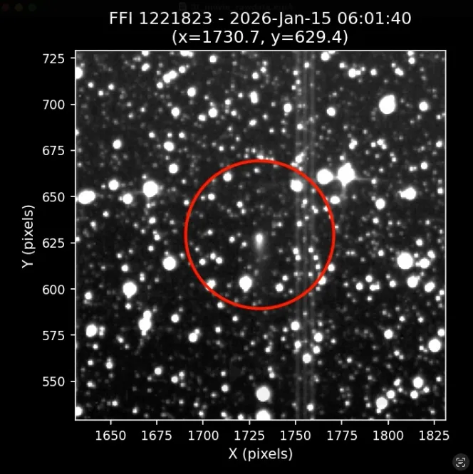 TESS image of interstellar comet 3I/ATLAS as a bright dot with a tail, surrounded by stars.