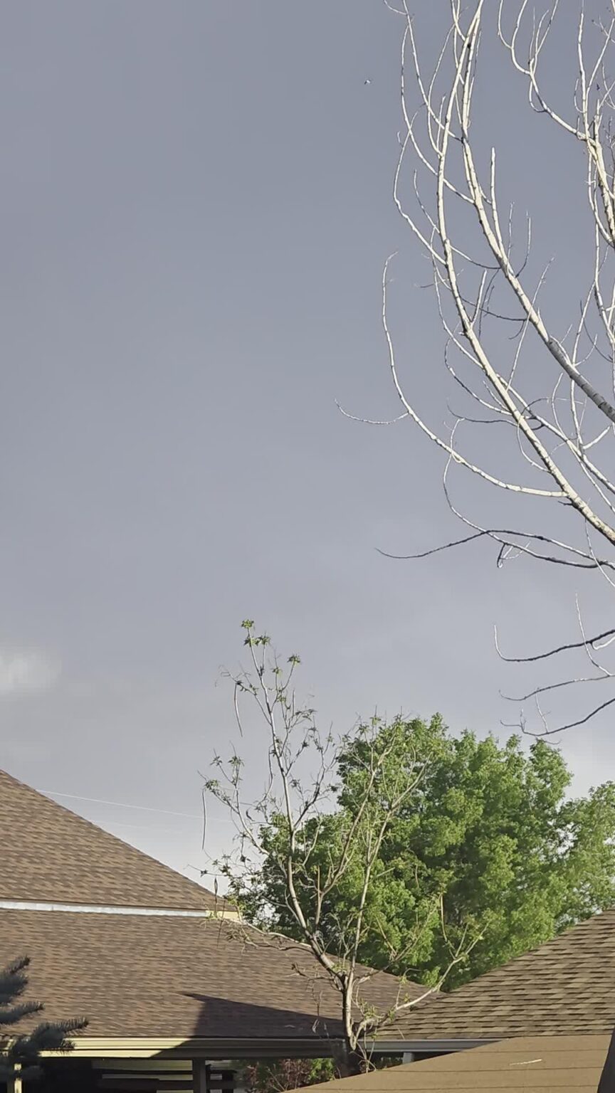 Weird object flying over my house bear Buckley AFB