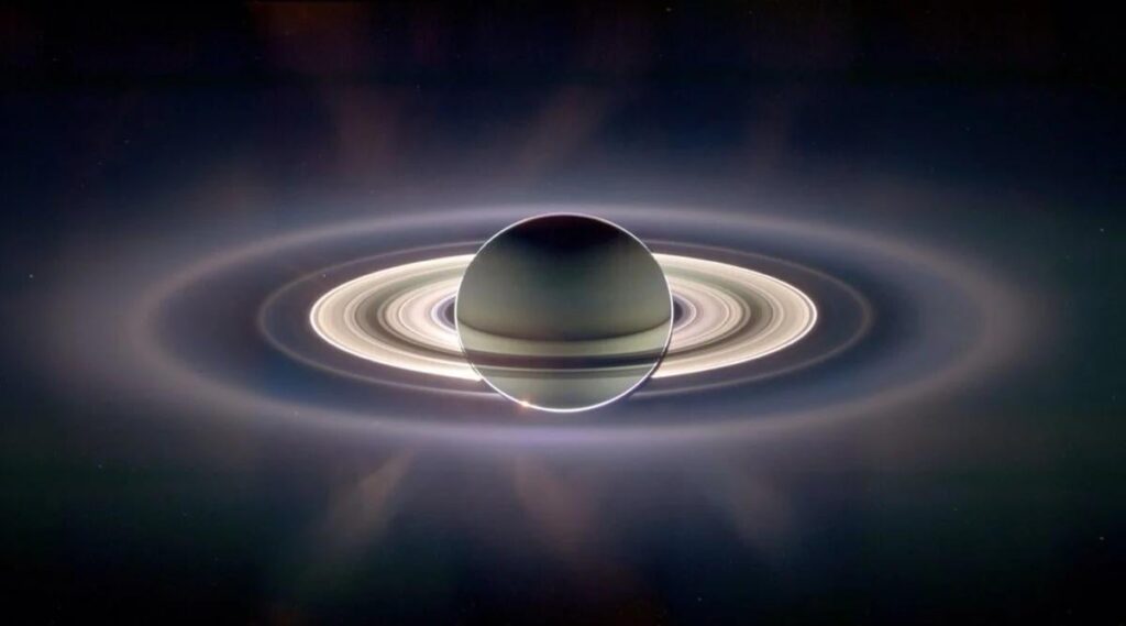 Can you spot earth in this picture of Saturn?