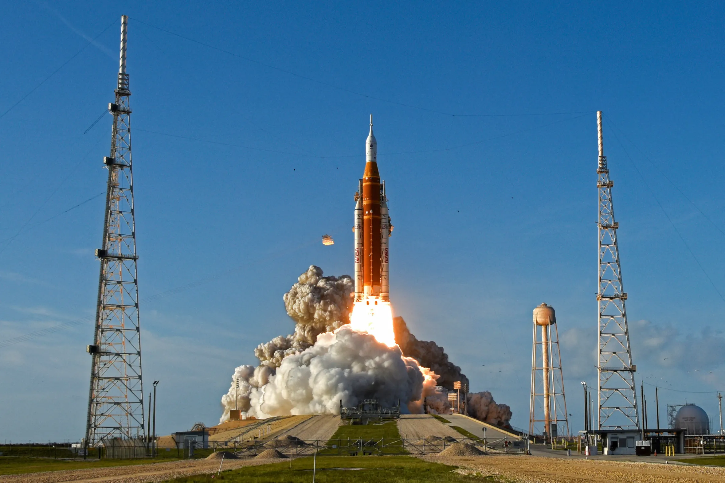 Artemis II mission's Space Launch System rocket with the Orion crew capsule lifting off from Cape Canaveral, Florida.