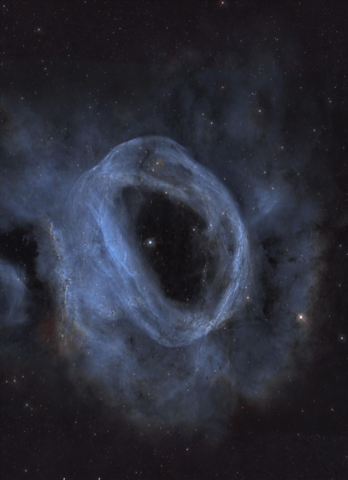 NGC 2020 is an HII Region surrounding the Wolf-Rayet star BAT99-59. It is located in the Large Magellanic Cloud. NGC 2020 has been created by a solitary mammoth star 200,000 times brighter than our Sun. Data from Hubble, processed by John Bozeman