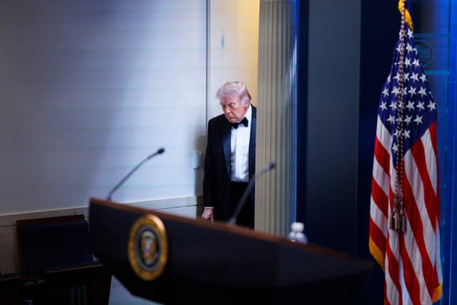 President Donald Trump arrives at the James Brady Press Briefing Room at the White House after a shooting incident outside the ballroom at the annual White House Correspondents’ Association Dinner in Washington