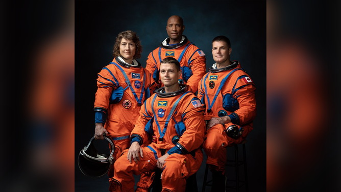 The crew of NASA’s Artemis II mission (left to right): NASA astronauts Christina Hammock Koch, Reid Wiseman (seated), Victor Glover, and Canadian Space Agency astronaut Jeremy Hansen.