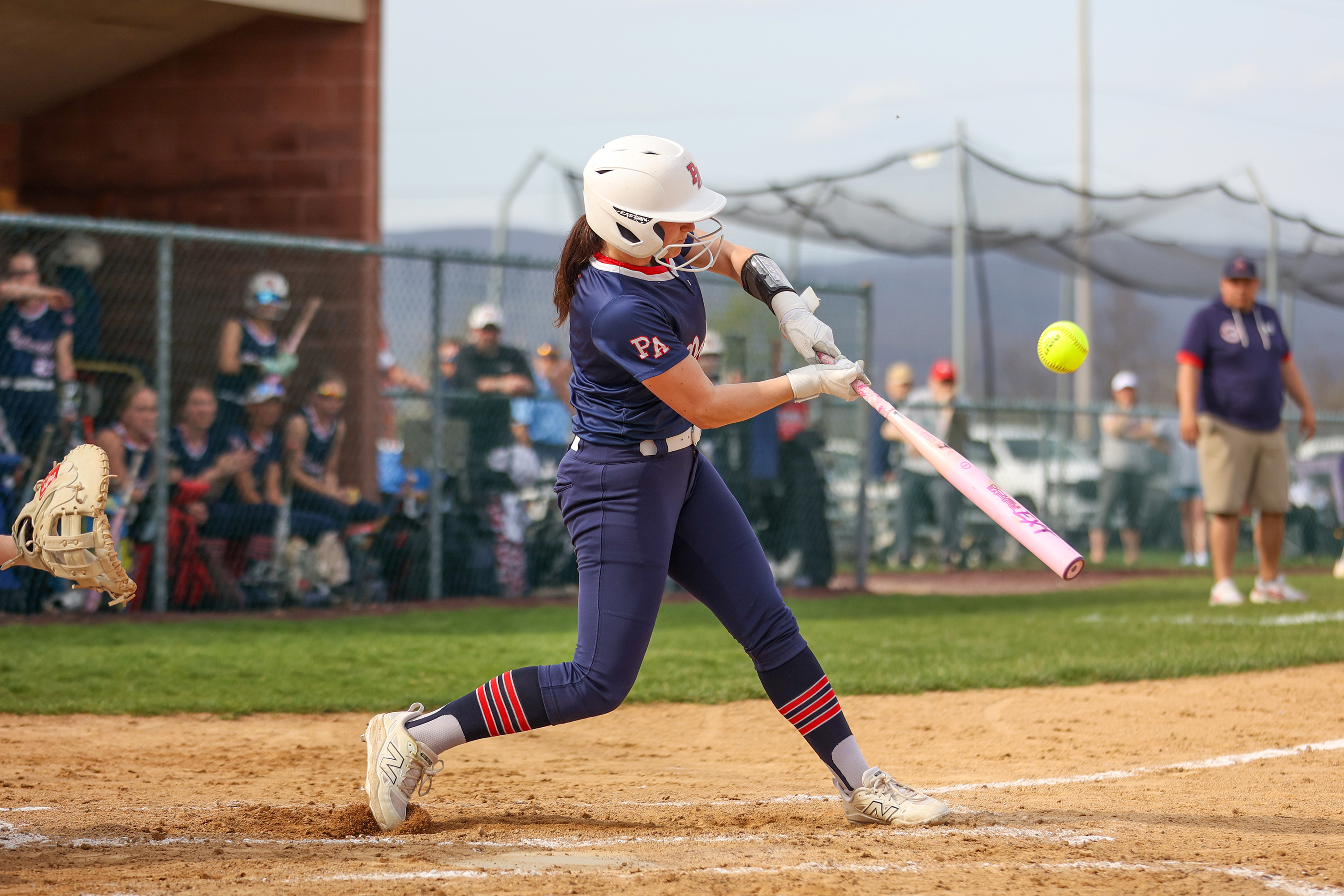 Pittston Area’s Jillian Haas takes a cut during a softball...