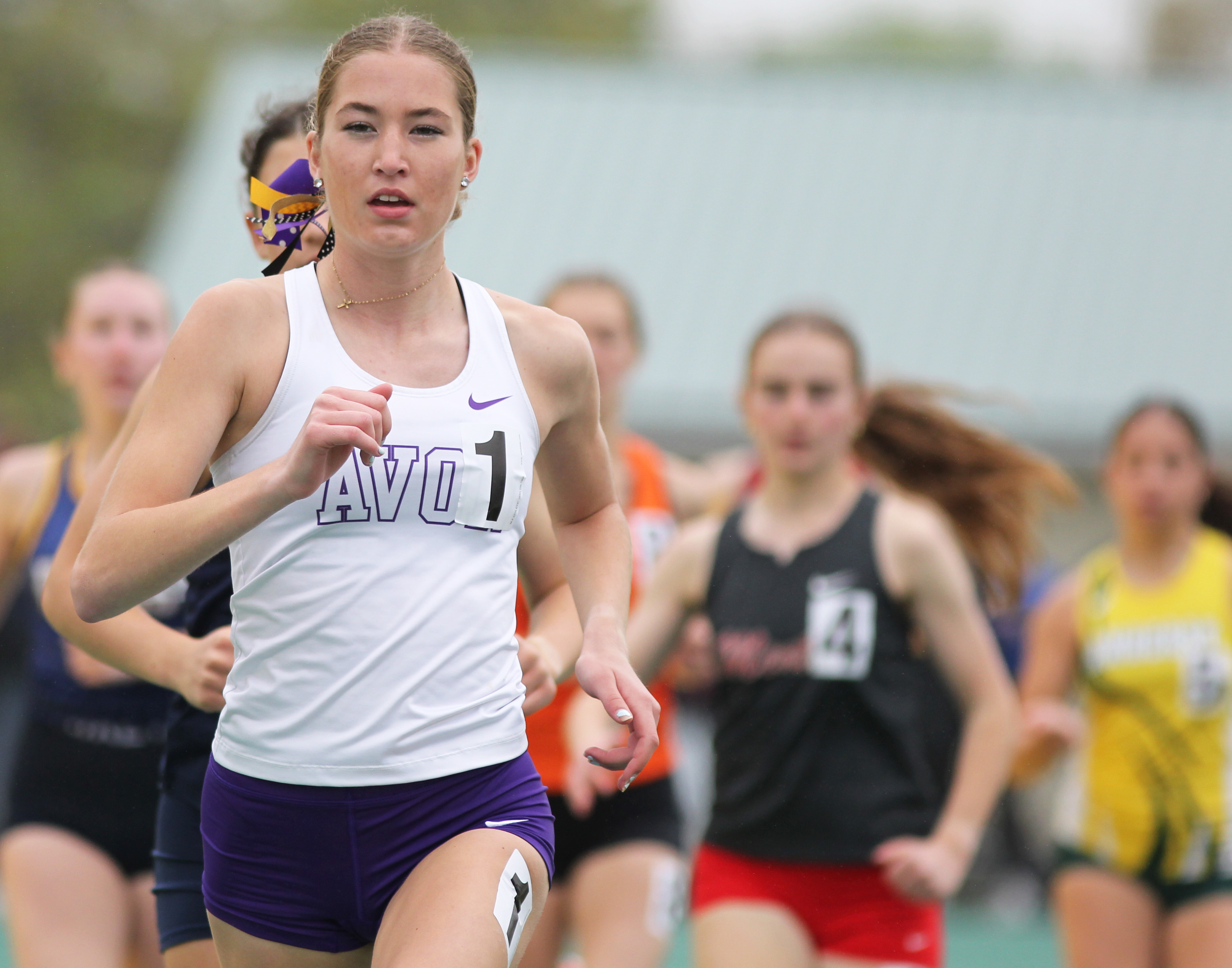 Avon's Kaitlyn Reese paces the 1600 meter run at the...