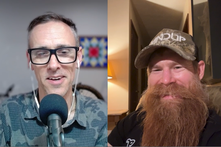 A split-screen image featuring two men smiling at the camera. The man on the left has short, gray hair, wears glasses, and a patterned shirt, speaking into a microphone with earphones. The man on the right has a long red beard, wears a camouflage baseball cap, and is seated in a well-lit indoor space with a cozy ambiance.