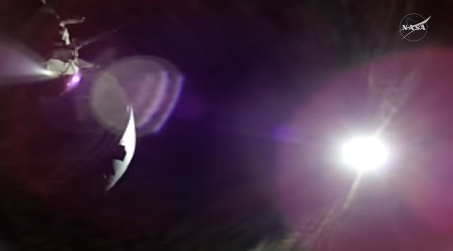 A cluttered image of spacecraft and bright lights in space.