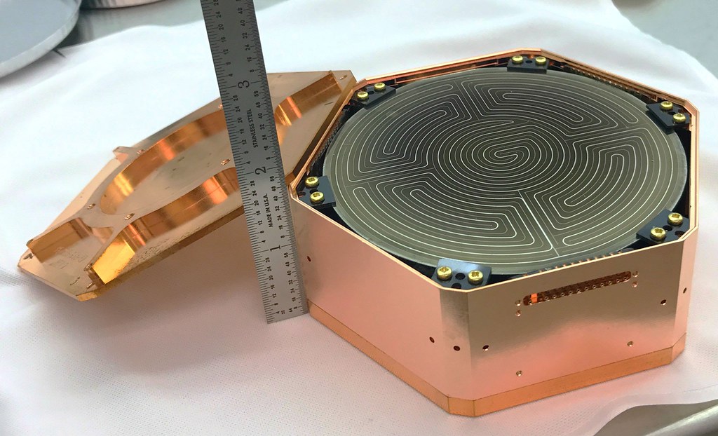 SuperCDMS germanium iZIP detector fabricated at Texas A&M - the detector can identify various types of particle interactions to reduce fake signals as SuperCDMS searches for rarer recoils from Dark Matter interactions.