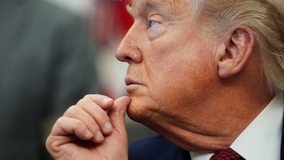 US President Donald Trump listens to speeches at the White House on April 18, 2026. Trump’s announcement on UFOs — a favourite subject of alien-conspiracy theorists — came in Phoenix at an event by far-right group Turning Point USA of the late Charlie Kirk. (Julia Demaree Nikhinson/AP Photo)