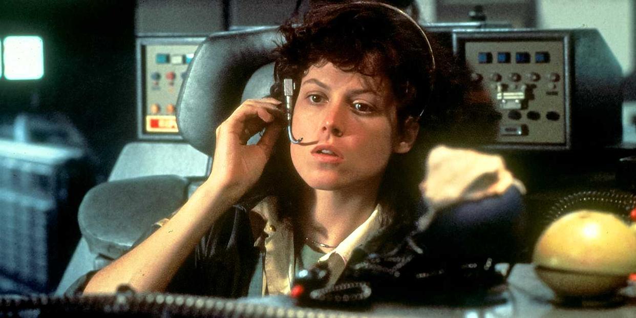 Sigourney Weaver on a headset in the cockpit of a spacecraft in Alien