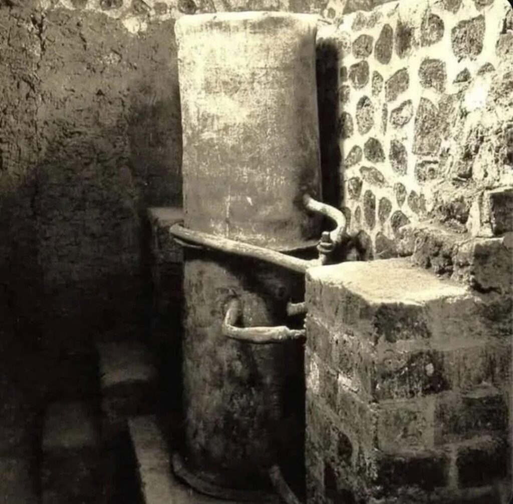 A Roman water boiler from the 1st century BCE that was discovered at Villa Della Pisanella in Boscoreale, Italy. It is one of the rarest examples to survive with its complete system of pipes and fittings intact.