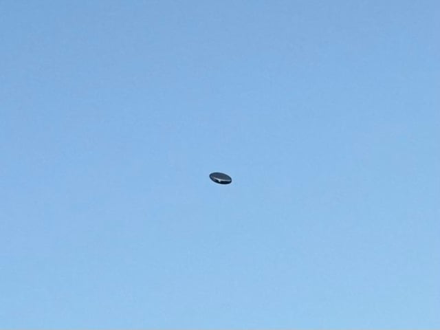 Mento shaped metallic object.