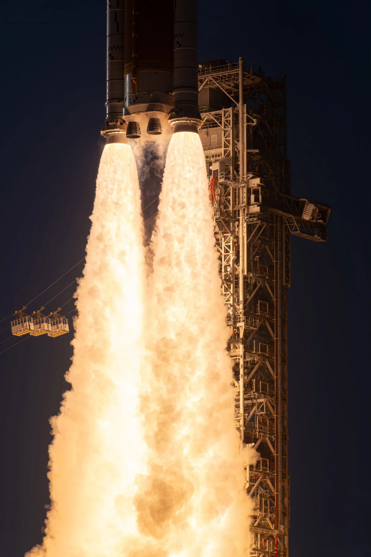 Flames of the Artemis 2 rocket as it launches.
