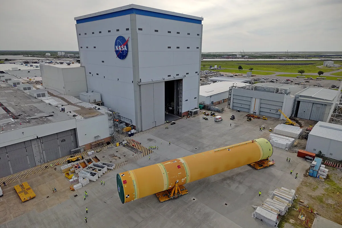 NASA began moving the core stage of the Artemis III Space Launch System rocket its Michoud Assembly Facility to the Pegasus barge in New Orleans on 20 April 2026. Credit: NASA/Michael DeMocker