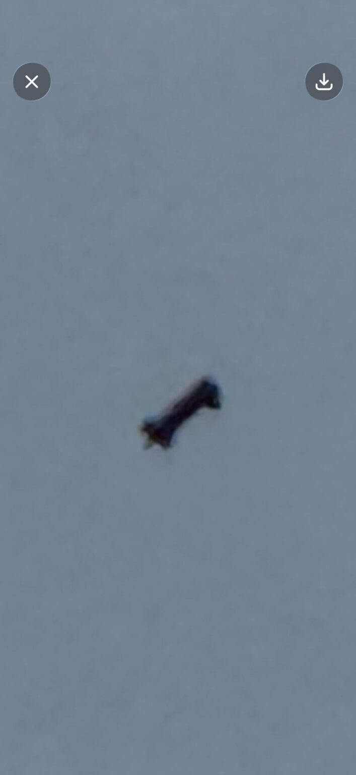 Strange silent tumbling dark object over Birmingham, UK – looked double at times, aircraft altitude, no sound. Not sure, any ideas?