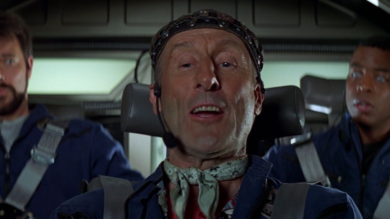 Riker, Zefram Cochran, and Geordi in the cockpit of the Phoenix in Star Trek: First Contact