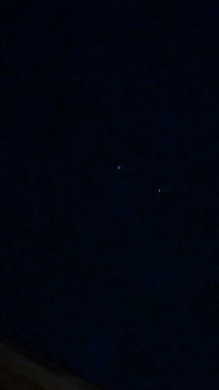 Serious: UAP or two satellites flying in synch?