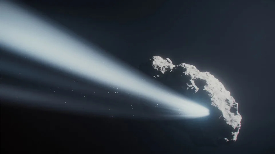  An artist's illustration of the comet shooting out a giant jet of gas and dust. 