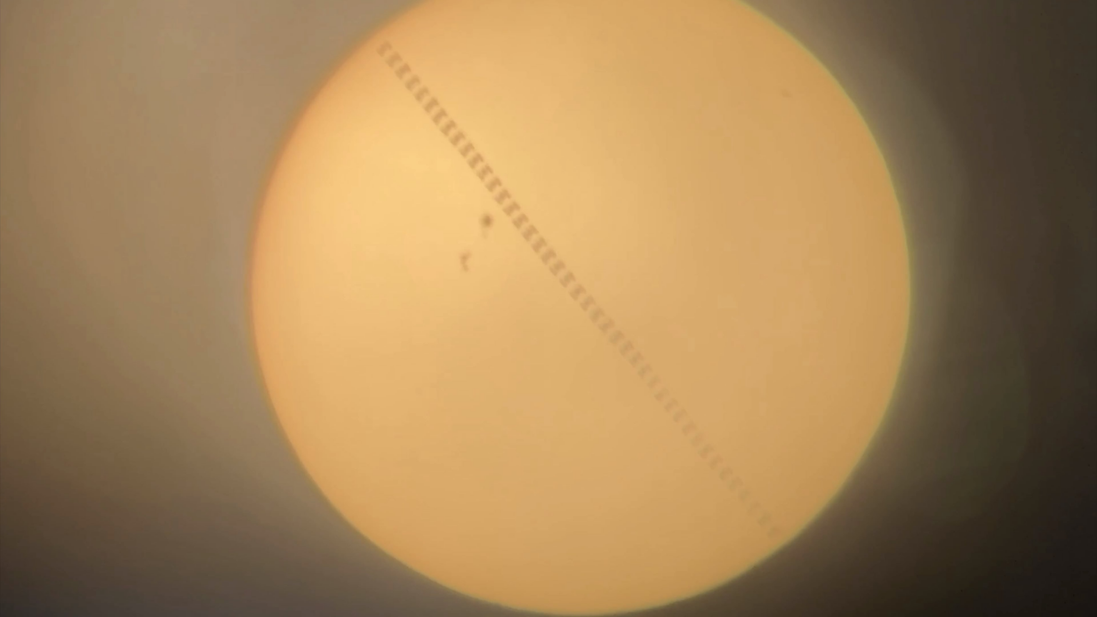 Captured the ISS transiting the Sun with a homemade telescope and an iPhone