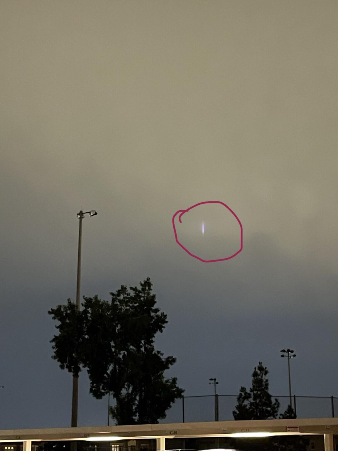 What is this? Bright bolt of light seen in Western sky from Gilbert, AZ. Bolt moved slowly upward in a straight line but remained the same length and width with no trail. Faded away after 5 minutes.
