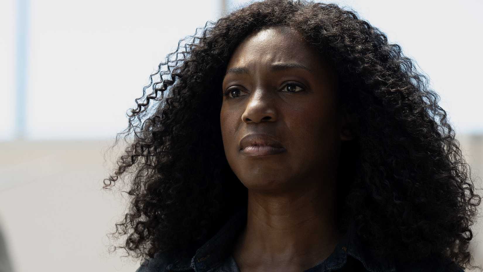 Enuka Okuma as Teri Rogers-Collins looking serious in Paradise season 2