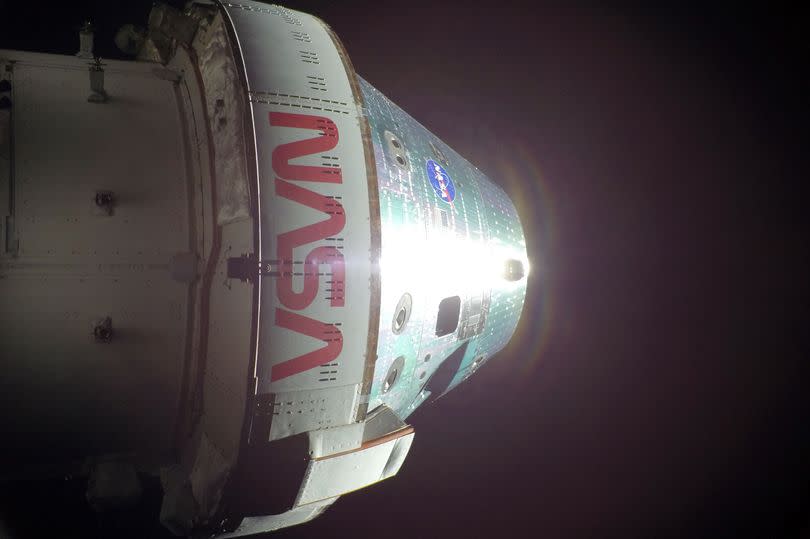 This handout picture released on April 8, 2026 by NASA, shows the Orion spacecraft on the sixth day into the Artemis II mission, photographed from one of the cameras mounted on its solar array wings, on April 7, 2026.