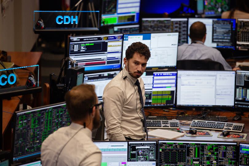 Flight controllers monitor the Artemis II Orion spacecraft from the White Flight Control Room at the NASA Johnson Space Center on April 8, 2026 in Houston, Texas.