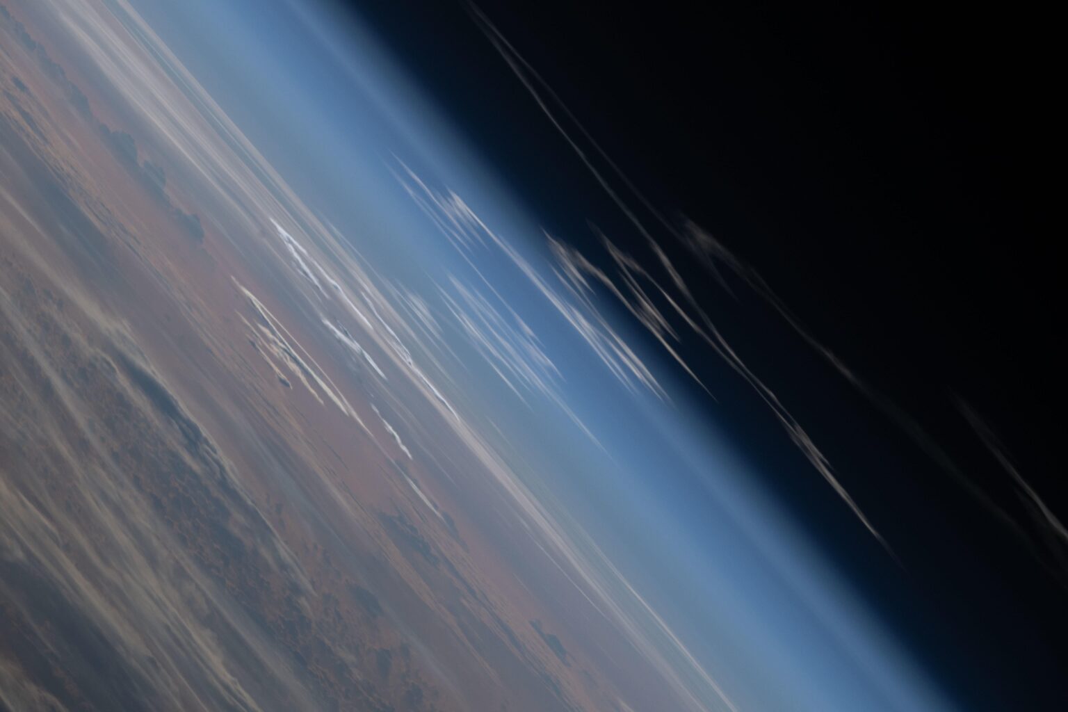 The exhaust plume left behind by Artemis II is pictured from the International Space Station  on April 1, 2026.