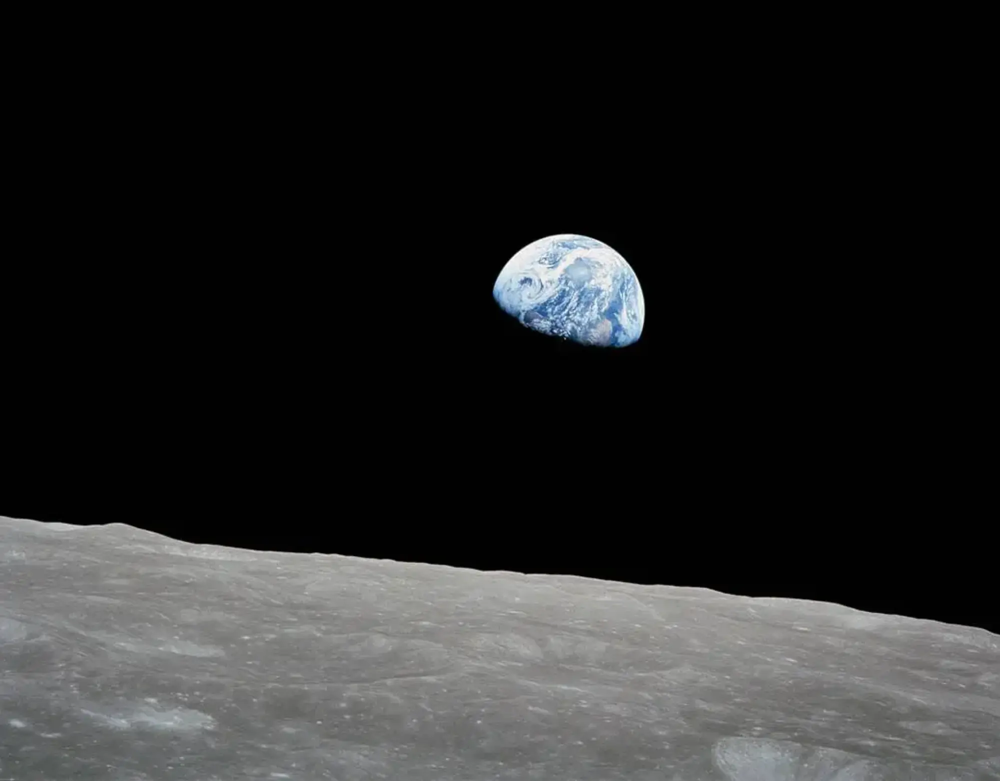 earthrise photograph by astronaut bill anders shows earth rising above surface of the moon on dec. 24 1968