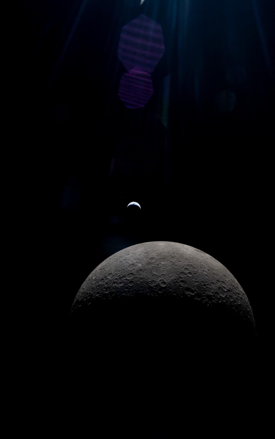 Moon's Farside in the Foreground, Earth Beyond
