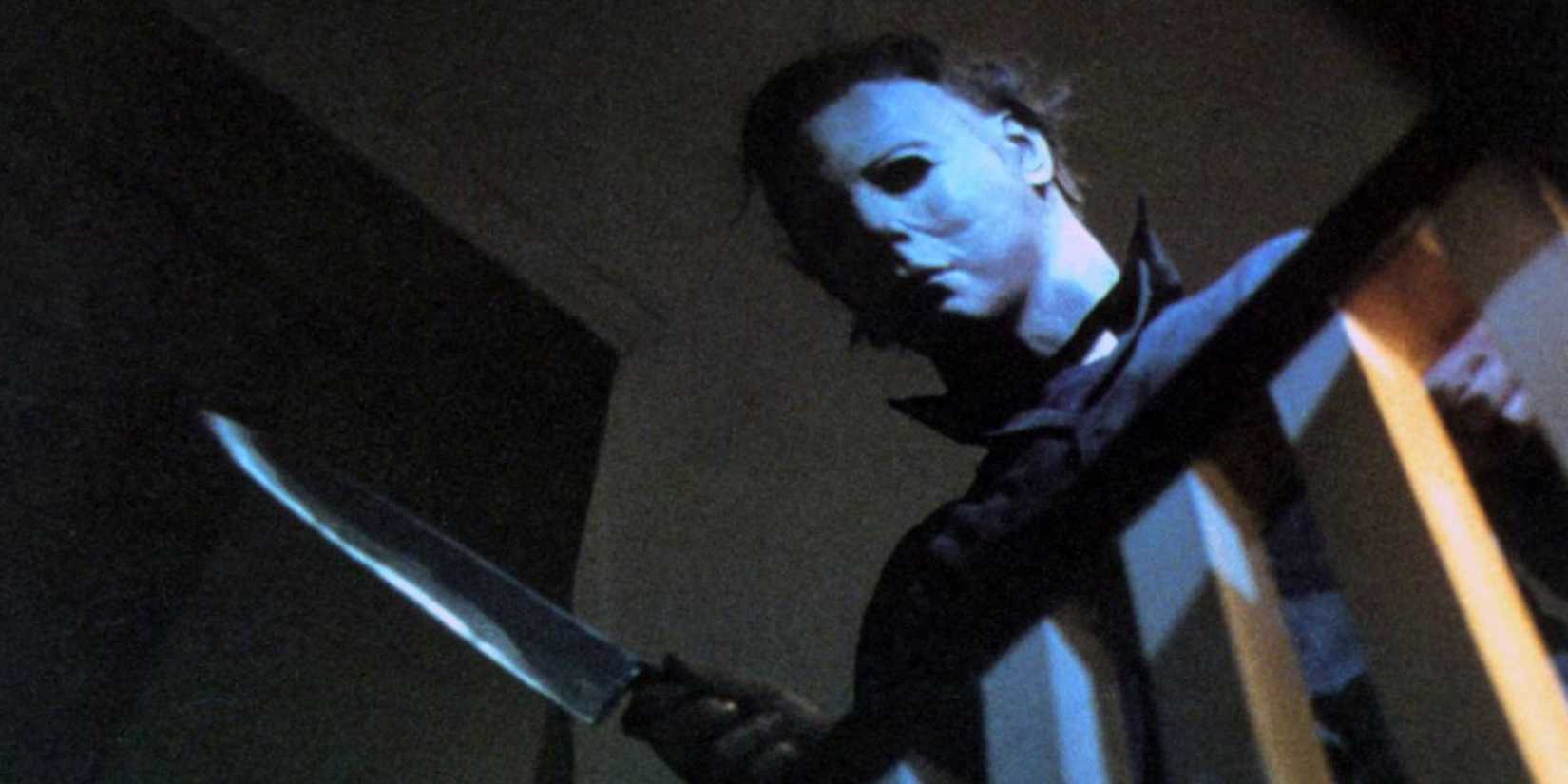 Michael Myers holding a knife in Halloween.