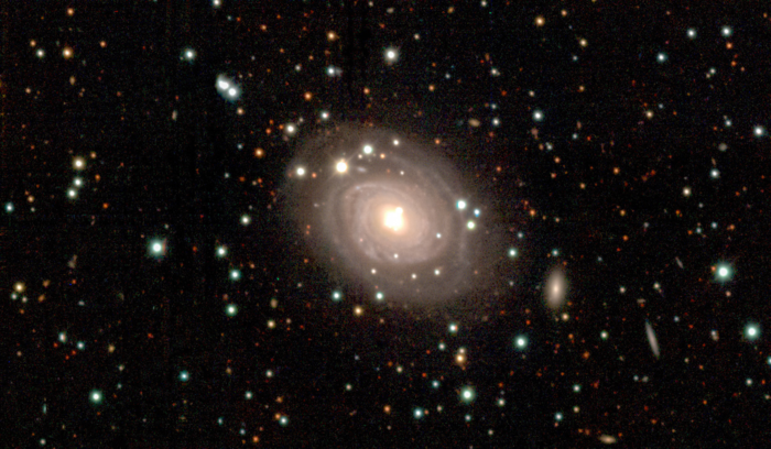 A view of the disk-shaped galaxy NGC 5292. The stable disk structure and the distribution of the surrounding galaxies can be checked.[Jang Seowon / Jeong Man-geun (Seoul National University)]