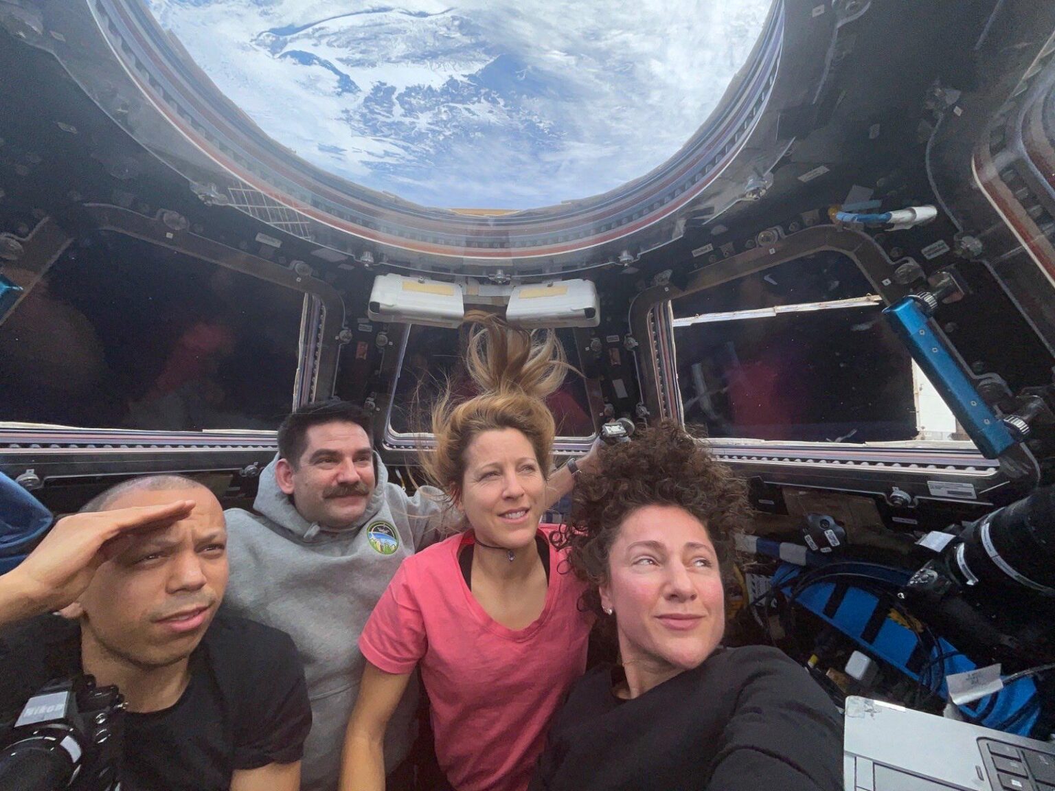 Beautiful moment of ISS crew awaiting the return of Artemis II friends.