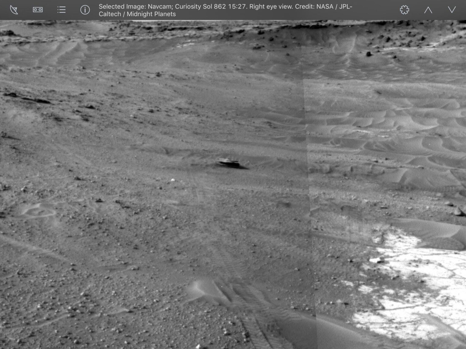 Maybe this is a Martian hub cap or a Martian barbershop quartet hat (skimmer)?