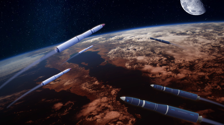 missiles crossing together in space over earth, hypersonic flight concept