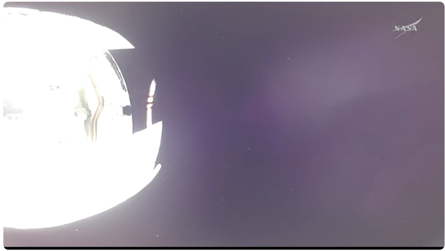 wat are the white specs in the bottom? photo from Youtube NASA video