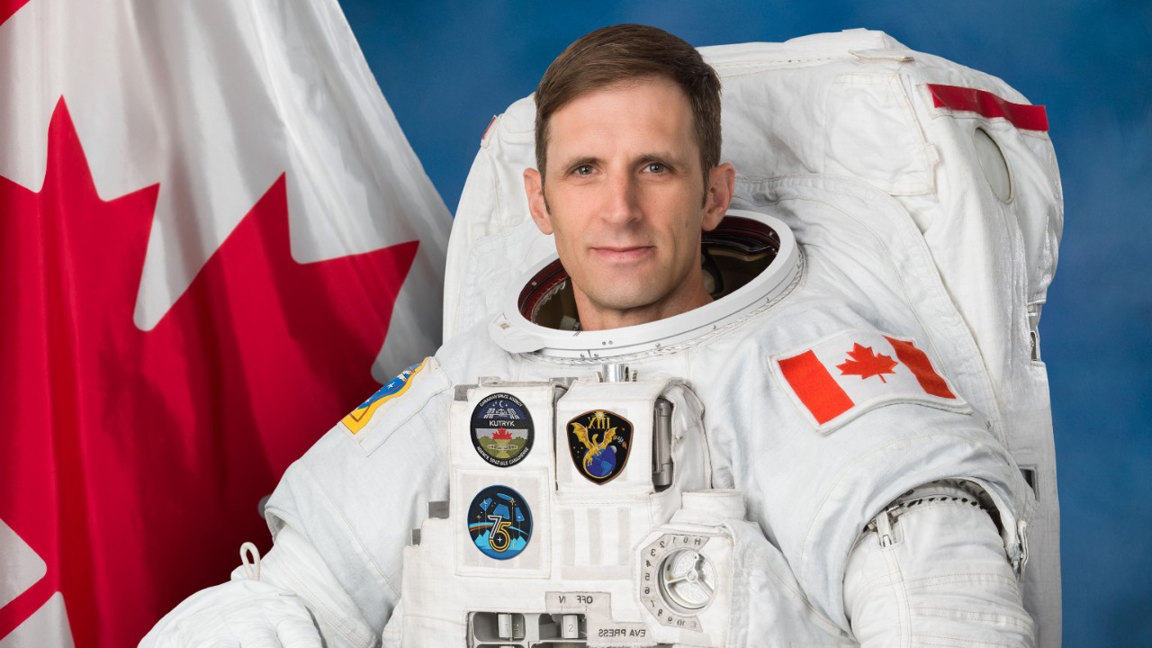 an astronaut in a white spacesuit