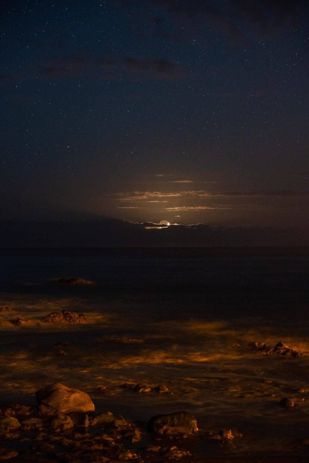 Moonset Over The Atlantic Ocean, captured with a camera