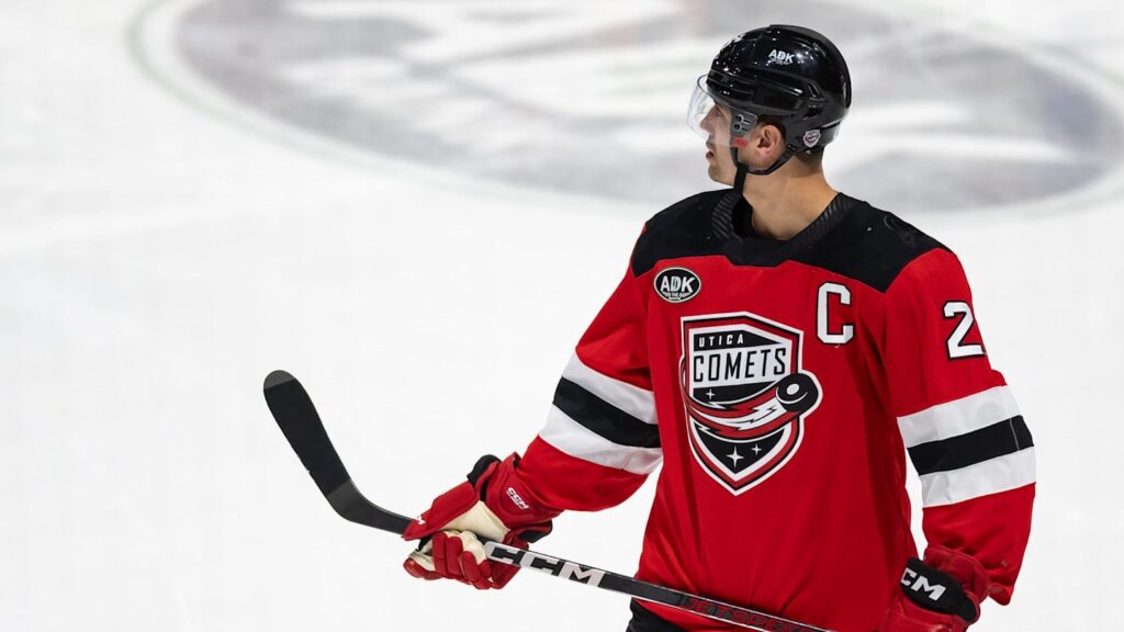 Utica Comets forward Ryan Schmelzer gets ready for the opening face-off at the Adirondack Bank Center on Friday, March 22, 2024.