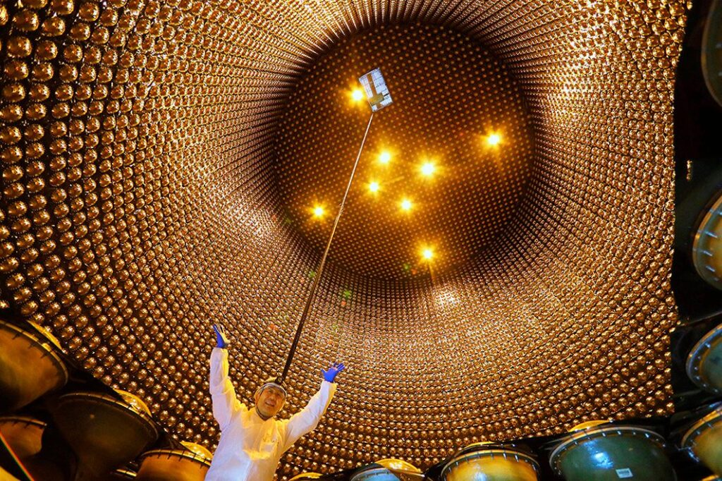 Meet the ghost particle: invisible, weightless and trillions of them pass through your body every second Inside of the tank of Super-Kamiokande, the world