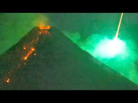 Flying object ascends from meteor strike behind a volcano.