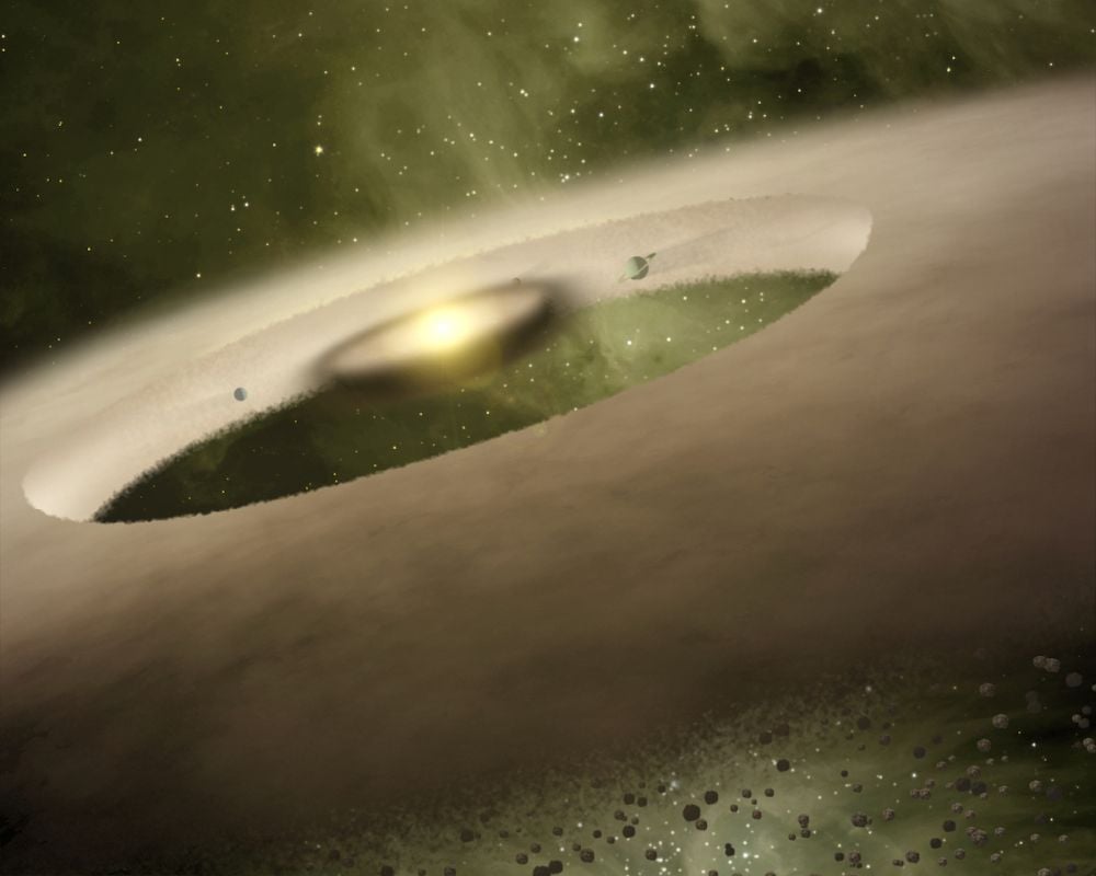 The Risk of Stellar Flybys and GJ 710 We know stellar flybys occur because we've seen them in other Solar Systems like this one. This illustration shows the dusty circumstellar disk surrounding the young protostar UX Tauri A, which is being perturbed by a passing star. We also know that our Solar System has experienced them, and will experience more in the future. What risk do they pose? Image Credit: NASA/JPL/Caltech