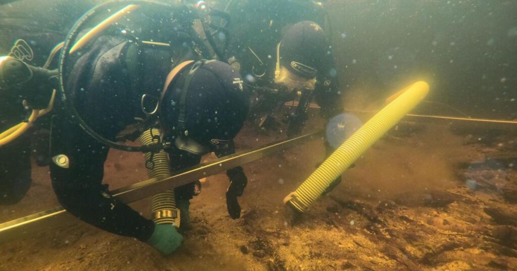 Wooden platform found hidden under Neolithic artificial island in loch