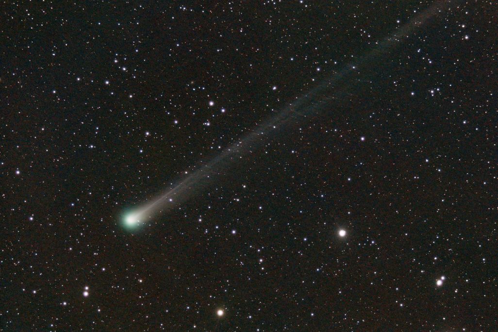 a green spot amid a sky of stars