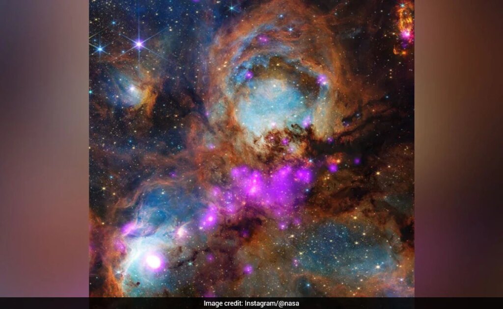 Cosmic Collab Of Two Space Telescopes Shows Cat’s Paw Nebula In Stunning Detail: “A-Meow-Zing” Cosmic Collab Of Two Space Telescopes Shows Cat's Paw Nebula In Stunning Detail: "A-Meow-Zing"